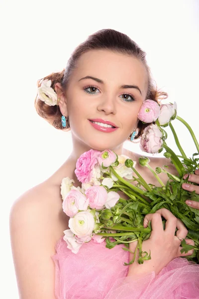 Mujer hermosa joven con un ramo de flores de primavera tierna —  Fotos de Stock